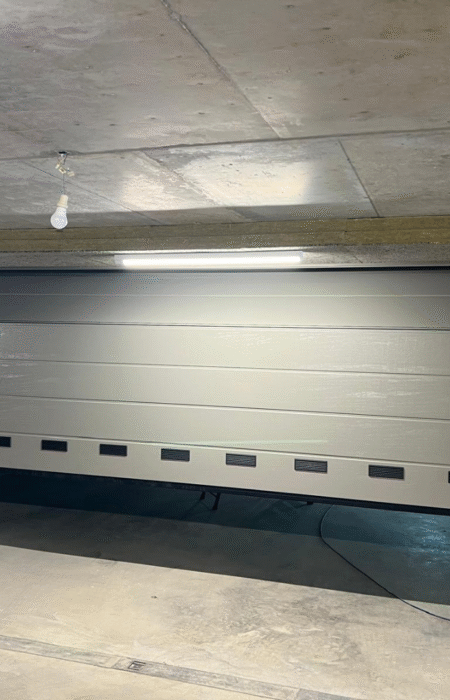 Transformation d’un parking en garage fermé à Gy
